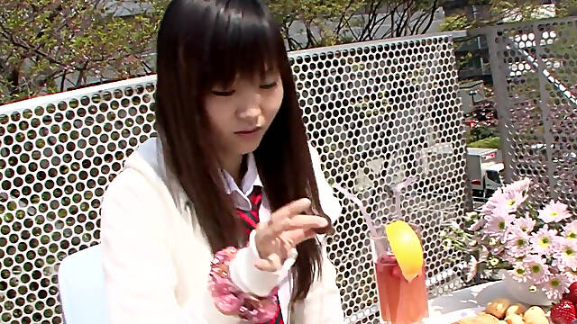 Japanese schoolgirl Ryo Asaka caresses herself in the shower
