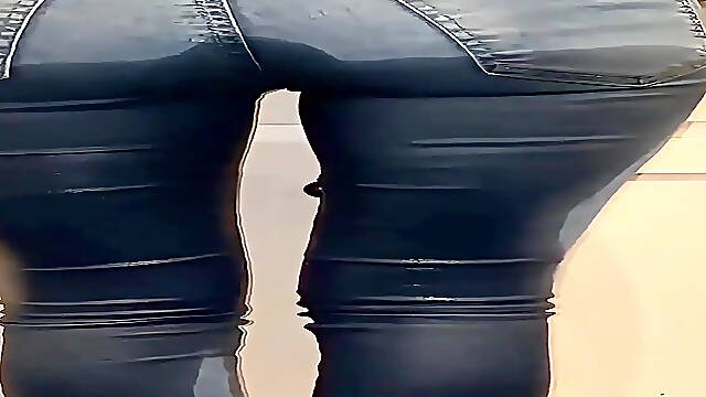 Sexy Asian MILF pees on jeans in her kitchen