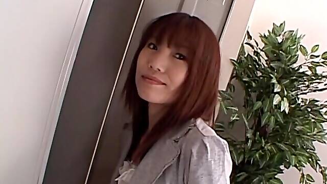 Japanese beauty Ibuki teases in a mini skirt, revealing her perfectly-shaven pussy