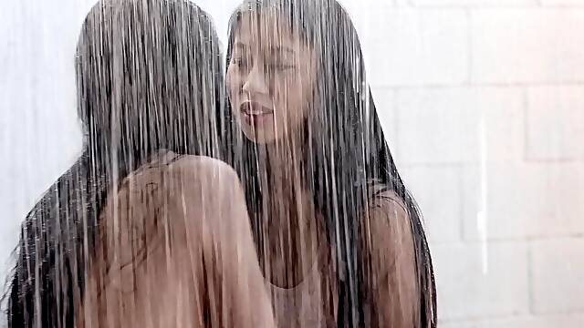 Rain makes long hair lesbians Jade Kush and Jade Baker dripping wet
